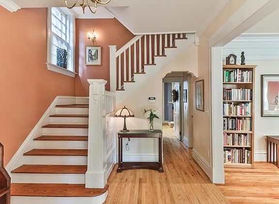 Gorgeous period wood staircase - new wood floors throughout main level.