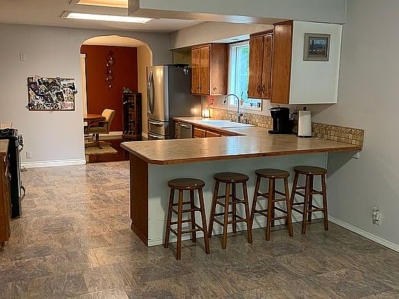 Kitchen looking into dining 