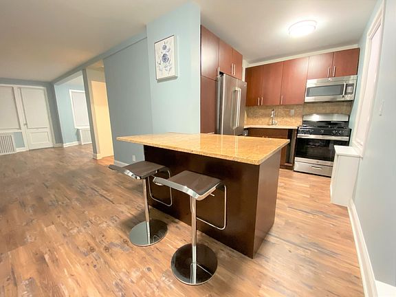 Living room and large Kitchen with dinning area (stools are included)