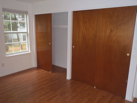 Master bedroom with dual closets.