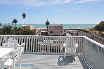 hear the ocean ; feel the breeze; watch frolicking dolphins, whales and diving birds...