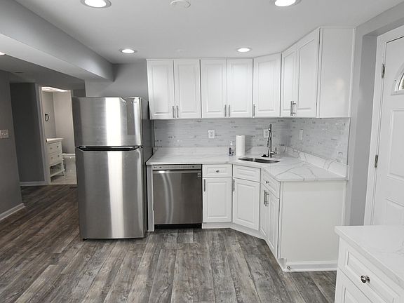Shared kitchen. All new quartz counters and stainless steel appliances.