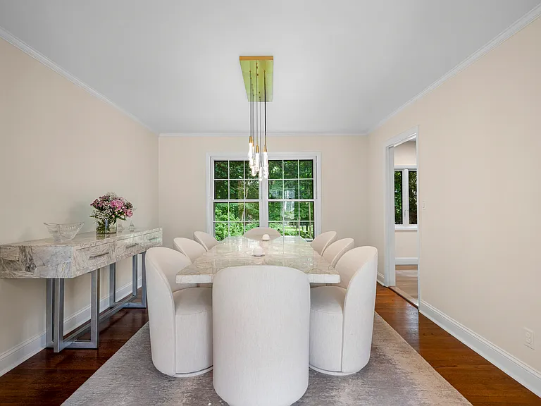 Formal Dining Room with easy access to the Kitchen, perfect for entertaining.