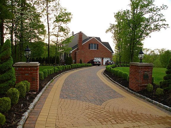 Brick Pillars with Lighting - and Custom Designed Paver Driveway 