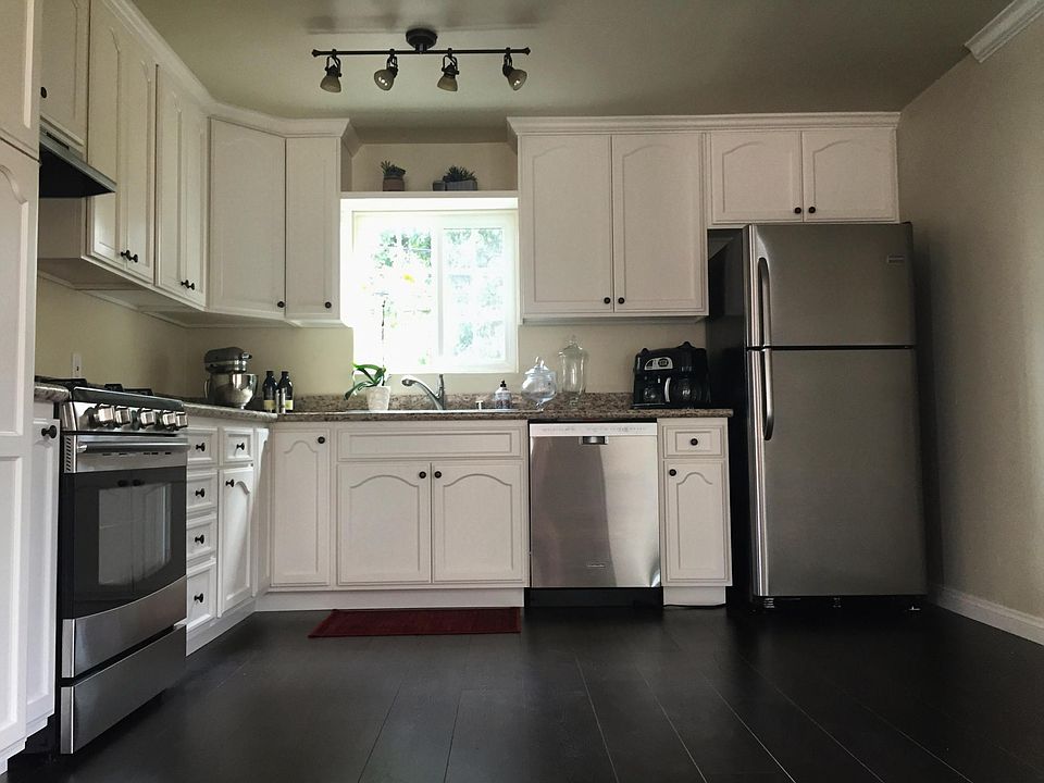 Custom solid wood cabinets with granite countertops in kitch