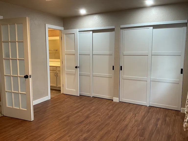 Master bedroom closets w/ entry door to master bathroom