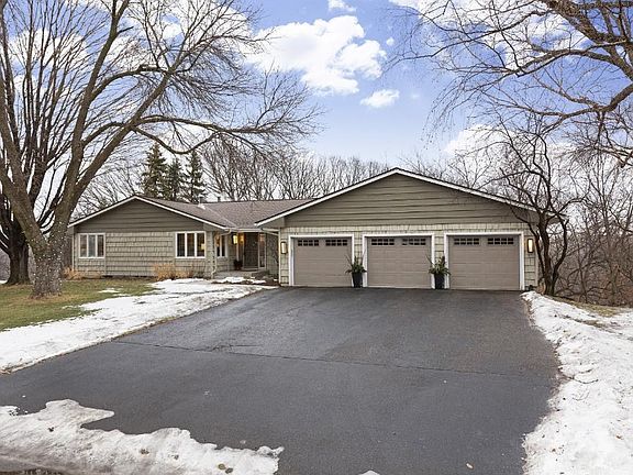 LOVELY REMODELED BREDESEN PARK RAMBLER WITH A FRESHLY PAINTED EXTERIOR AND NEWER ROOF & GUTTERS (2011-2013). THREE-CAR GARAGE WITH EPOXY FLOOR.