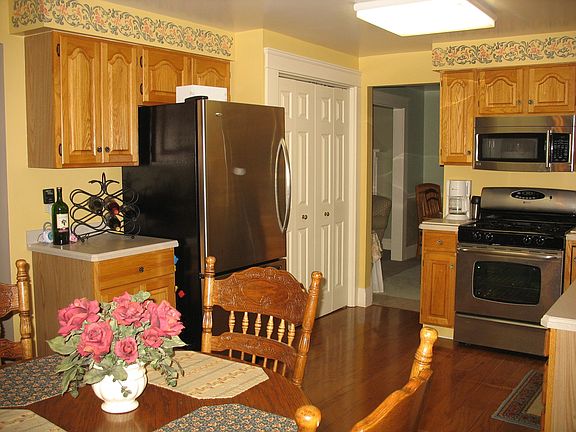 New stainless appliances and hardwood floors. 