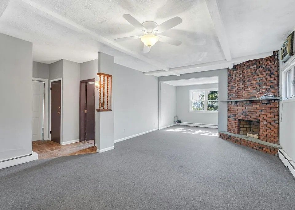 Living Room/Dining Room with New ceiling fan and light.