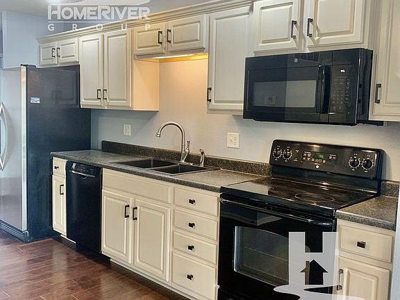 3rd image of 9851 N Lewis Ave #0