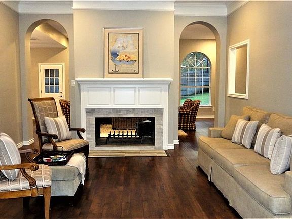 Dual sided fireplace separates living areas