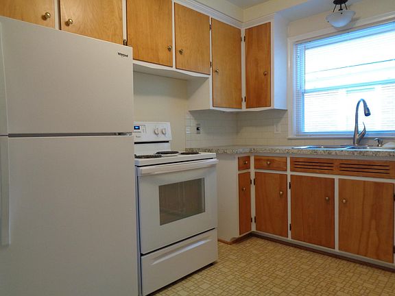 Kitchen Entrance - Kitchen is furnished with new counter, sink, and appliances.