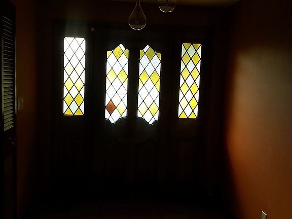 Front door. Fresh paint on entry way