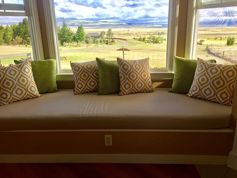 Bay window with view of Mauna Kea and Mauna Loa