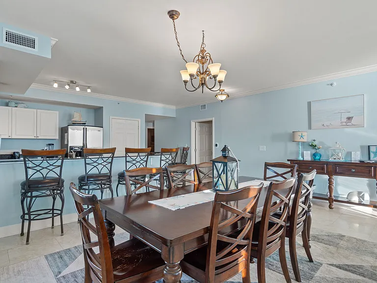 8-seater dining table is provided for our guests.