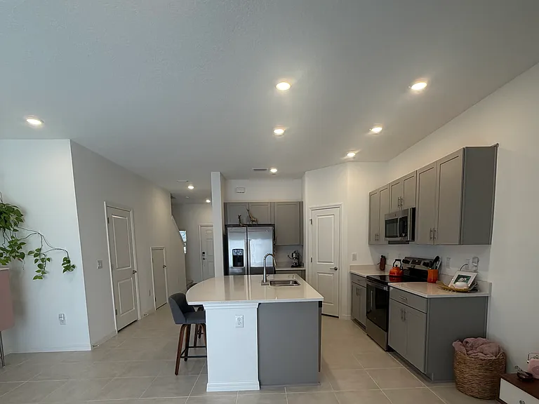 Kitchen into living room.