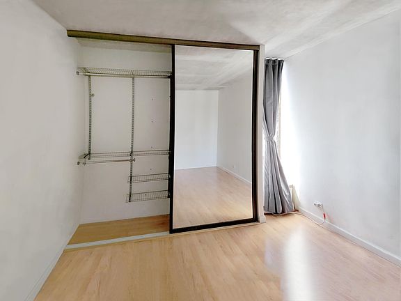 Bedroom, new closet system, AC window unit.