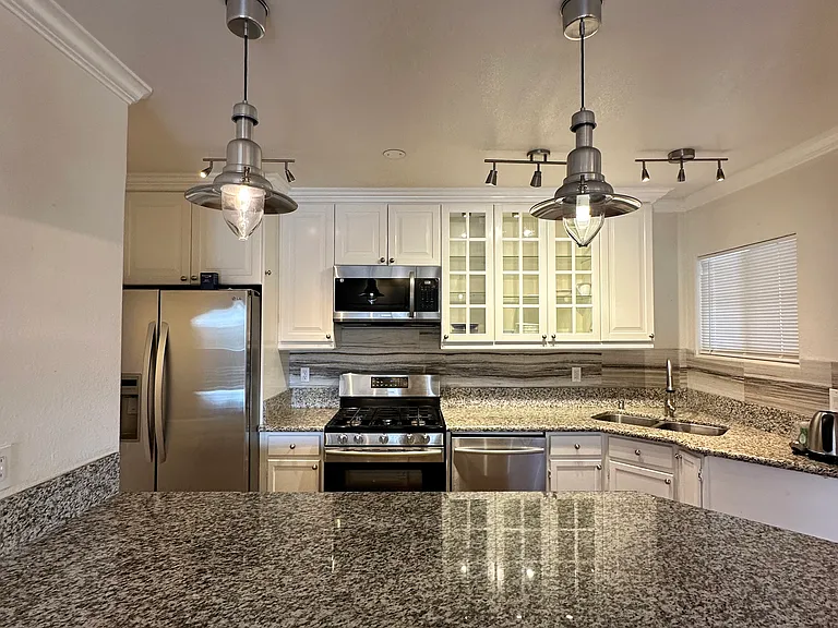 Samsung appliances, granite countertops. Brand new microwave and garbage disposal.