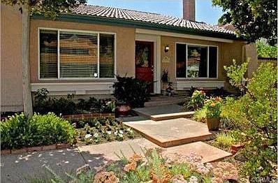 Fabulous single level home with a back yard to DIE for!!  Incred