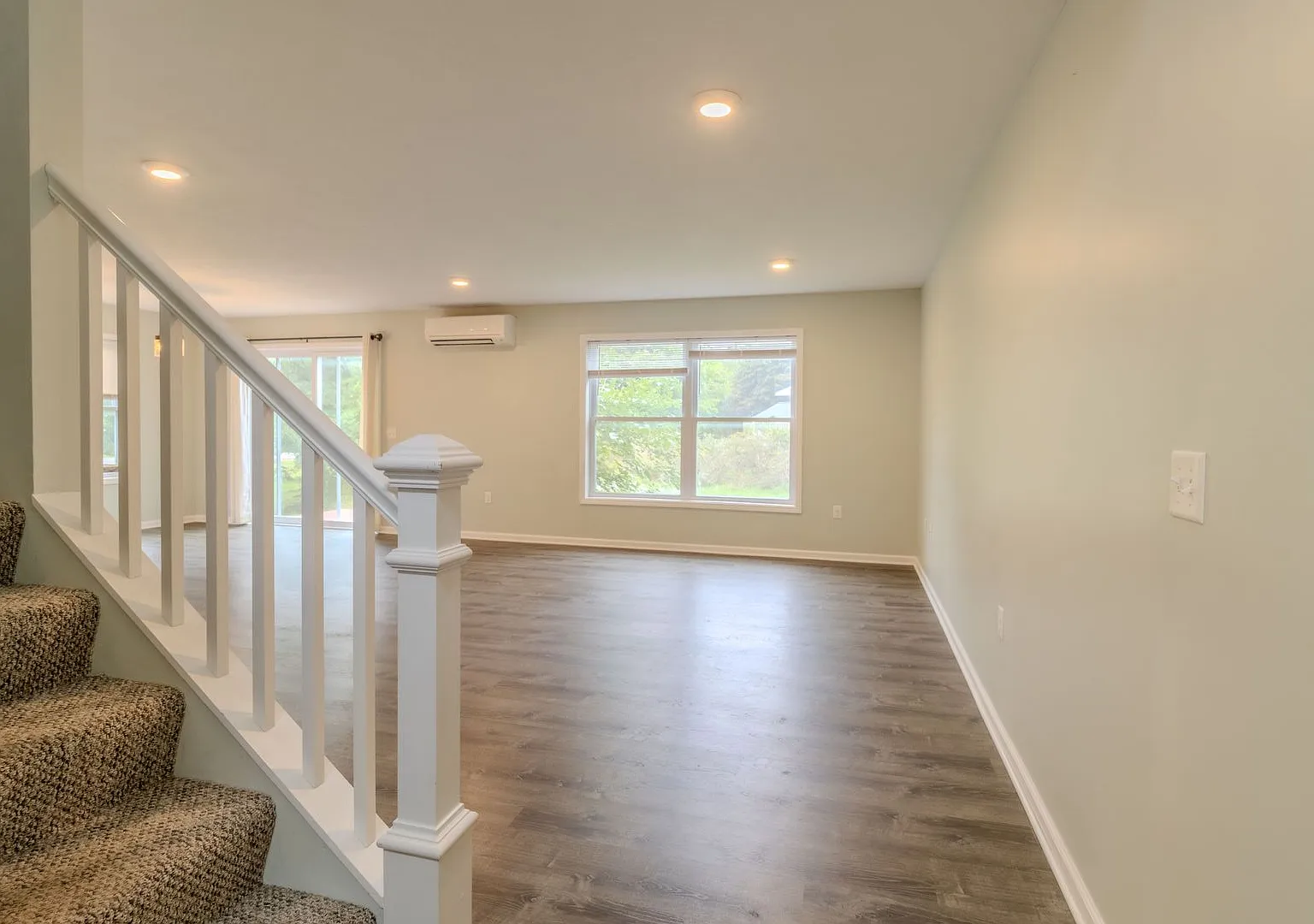 Stylish End-Unit Living | 3BR + 2.5BA — Photo 2