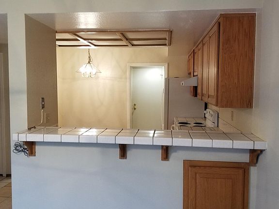 Contemporary kitchen with new refrigerator