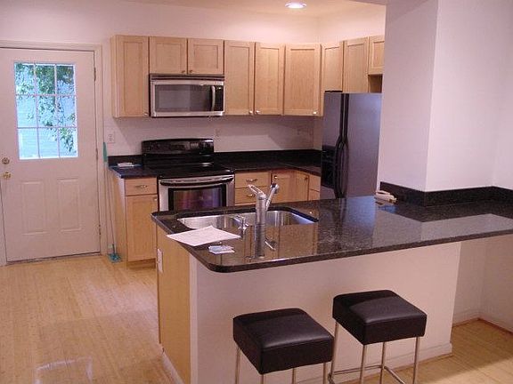 Kitchen with stainless steel appliances and granite counter tops