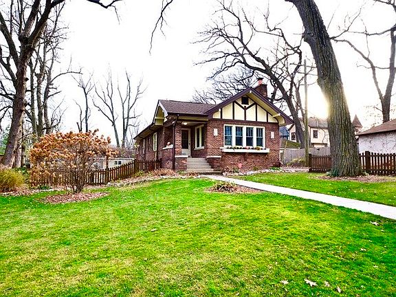 Large lot, with beautiful gardens and mature trees.