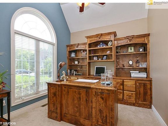 First-floor office/den, desk and built-ins stay!