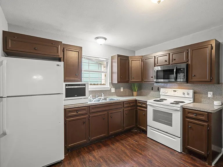 Each cabinet is a labeled with a room number sticker.