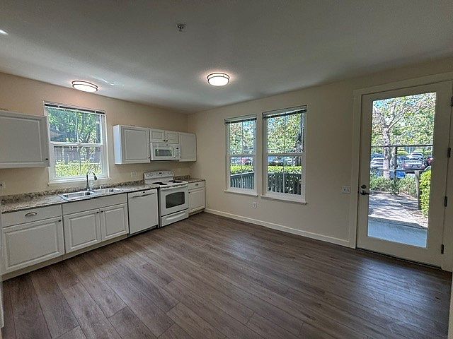 Kitchen looking towards private porch.