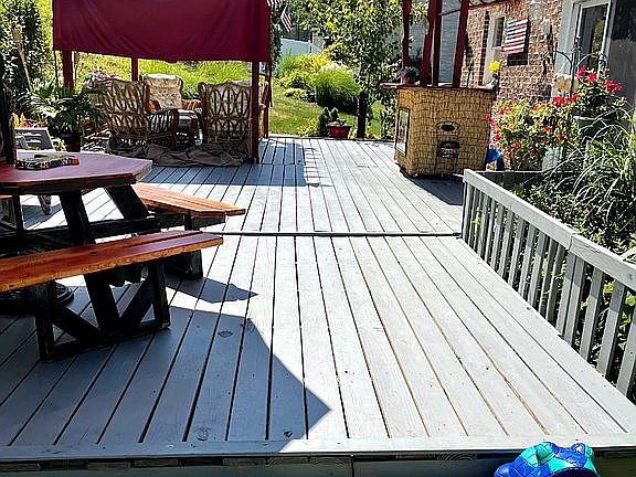 Huge deck new!  Length of house