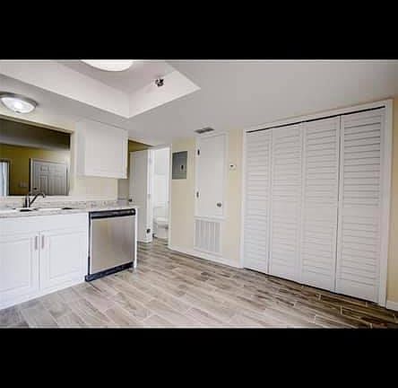 kitchen / dinning with Laundry area (see guest bath towards left side)
