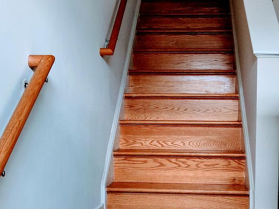 Stairs to the upper level from front door.