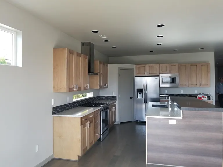 Beautiful modern kitchen with lots of cabinet space and pantry.