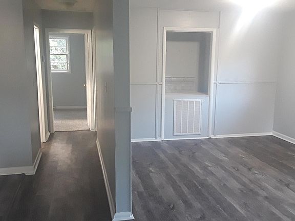 As you walk into the main entrance. Living room on the right, kitchen to your left.