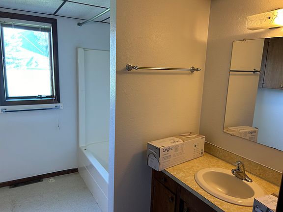 Bathroom, Washer and Dryer hookups located across from shower