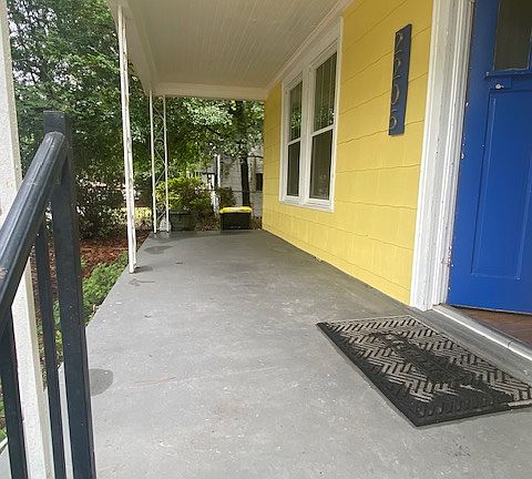 Large, covered front porch.