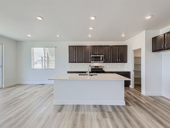 5464 Riverbend Kitchen at Barefoot Lakes in Firestone, CO