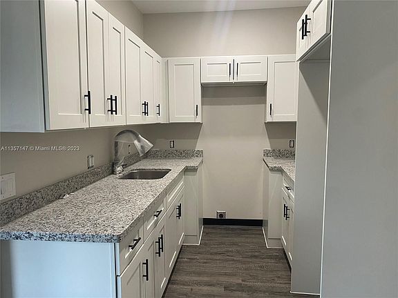 3rd image of 628 NW 3rd Ave