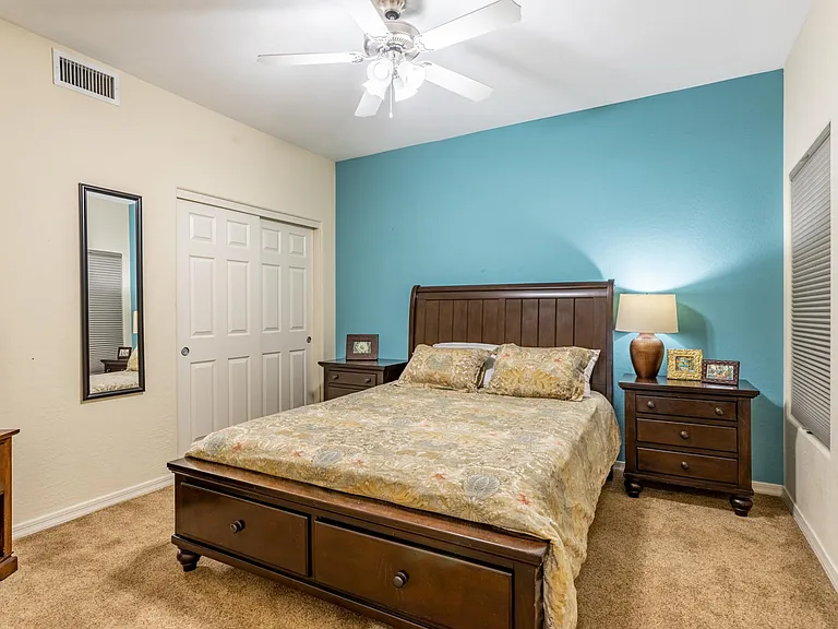 Guest bedroom with walk in closet, comfortable Queen bed