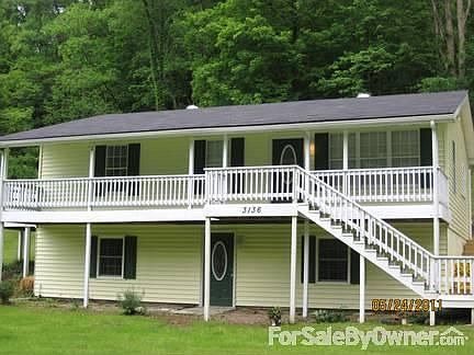 Beautiful country home. : All this porch needs is a couple of rocking chairs so you can enjoy the ou