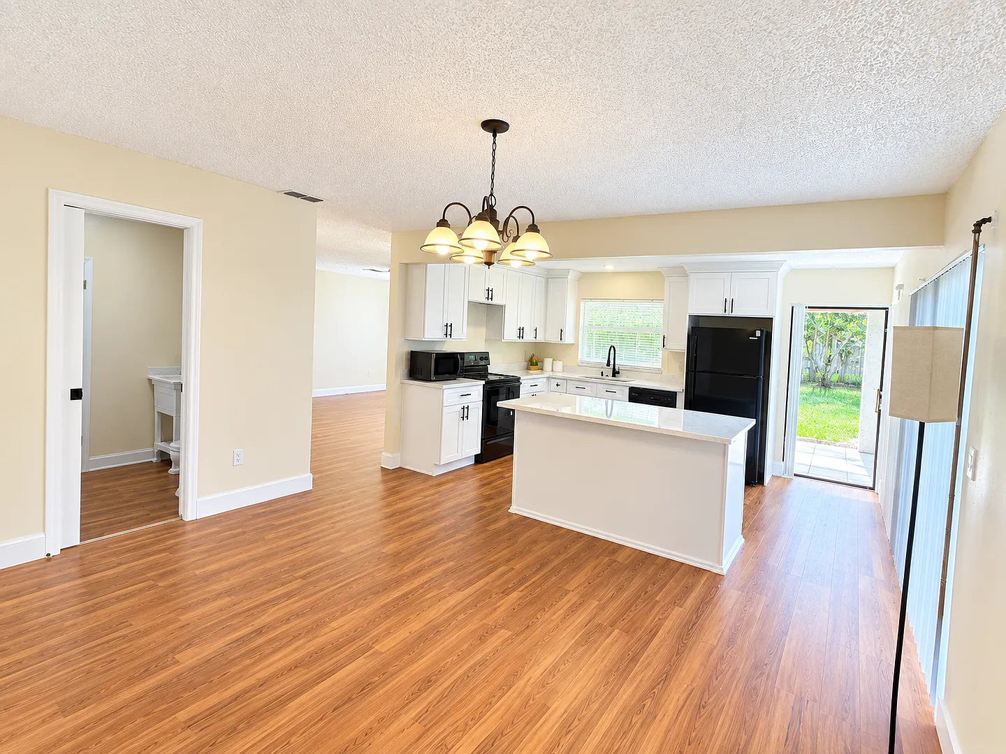Spacious 3BR Home with Included Internet & Large Backyard! — Photo 2