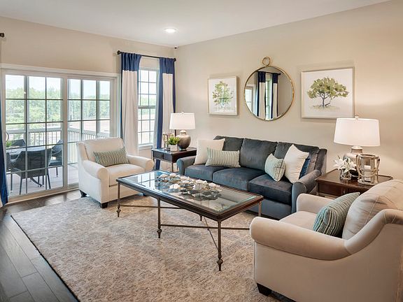 Gathering room opens to kitchen area