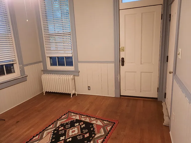 living room, looking towards outside door