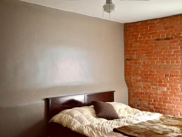 Charming exposed brick (bedroom 1)