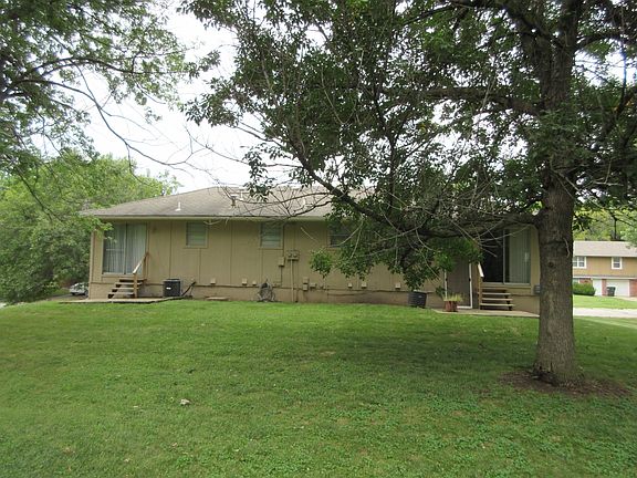 Back yard with mature trees