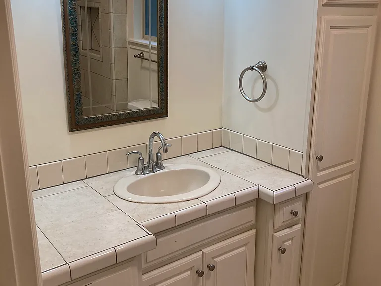 Full Bath on the main level. Bathtub and shower.