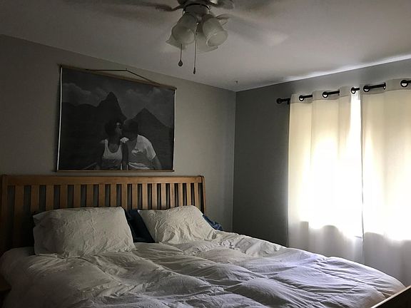 Master bedroom fits a king bed and looks out onto the backya