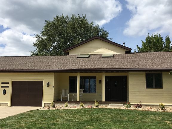 Front view, covered porch.