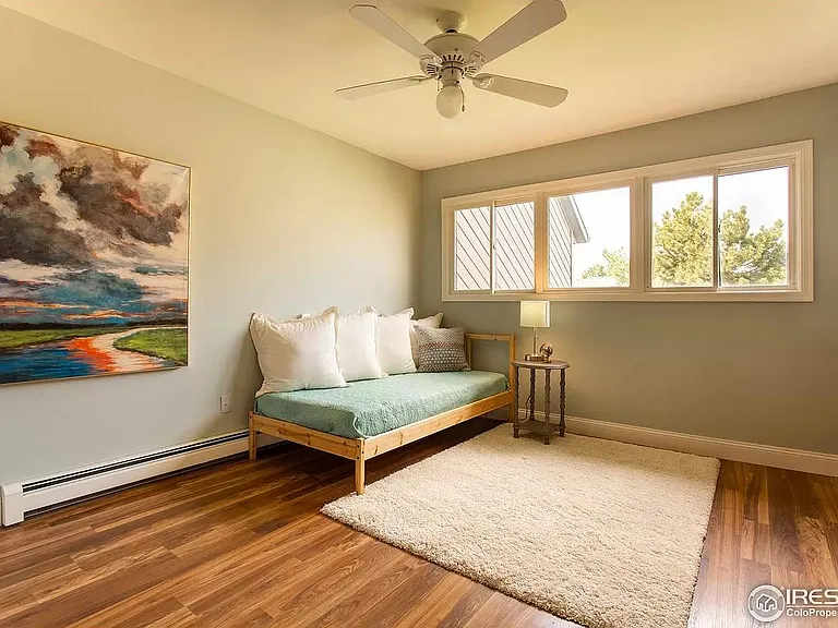 The 3rd floor large bedroom now features a heat pump on the left wall in the photo.